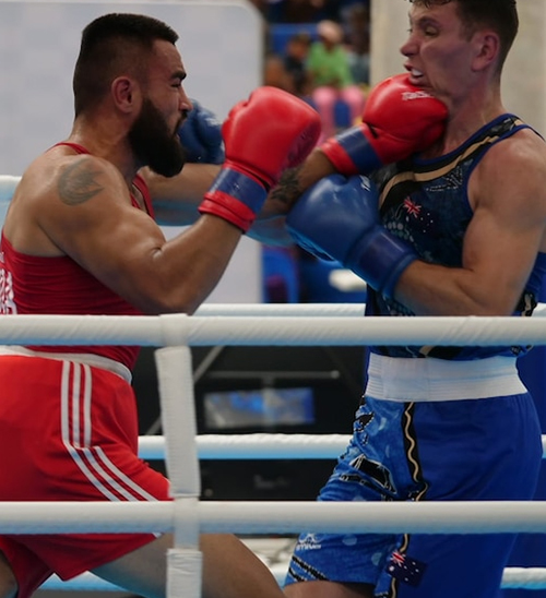 Samoan Ato Plodzicki-Faoagali comes out firing to block Australian boxing sweep