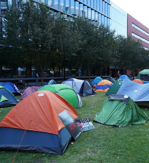 University of Adelaide security strengthened after fireworks lobbed at pro-Palestinian protest camp